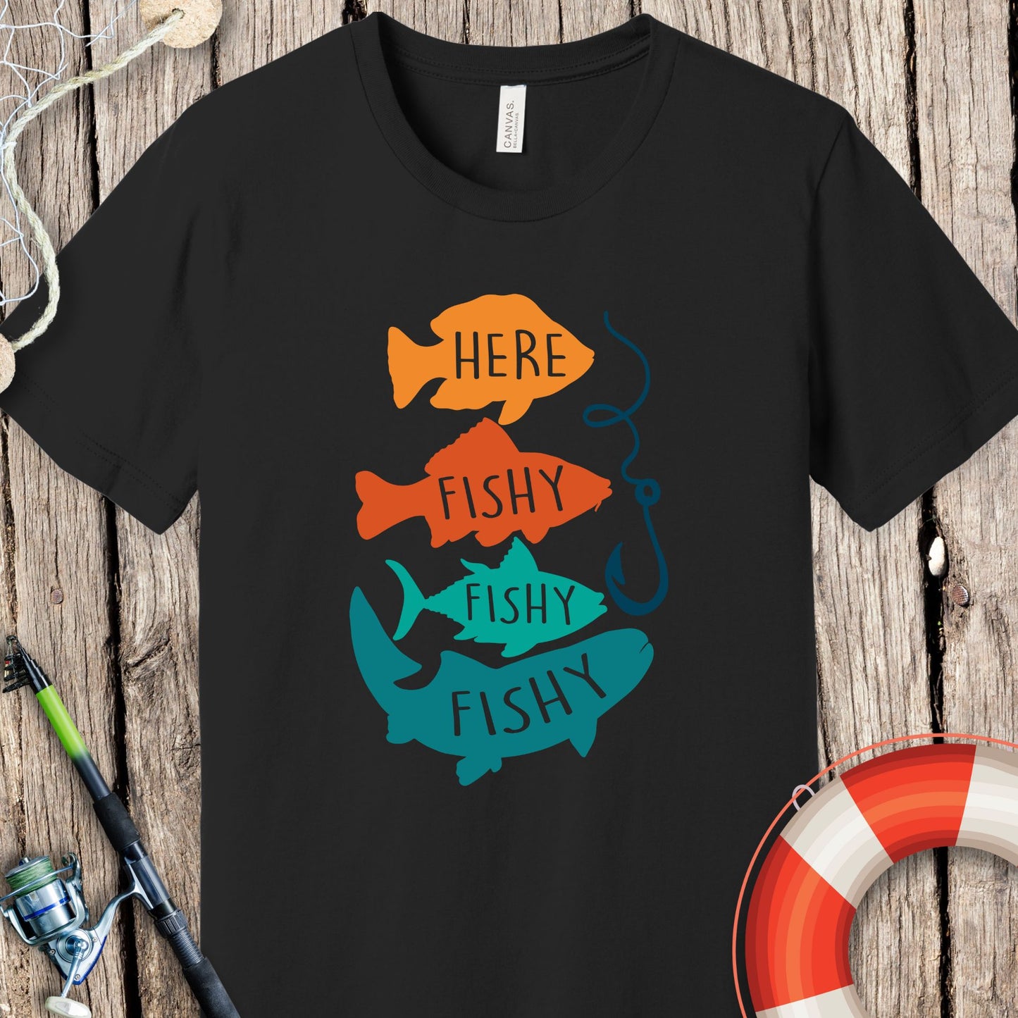 Black Printify fishing t-shirt with colorful fish graphic and humorous fish hook design