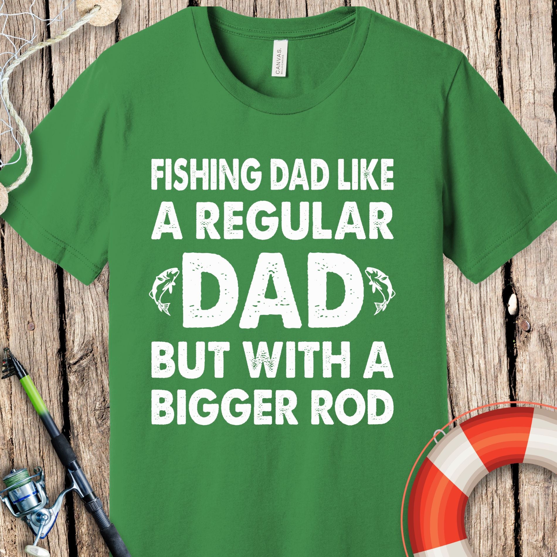 Green fishing t-shirt for dad with white text saying Fishing Dad Like A Regular Dad But With A Bigger Rod